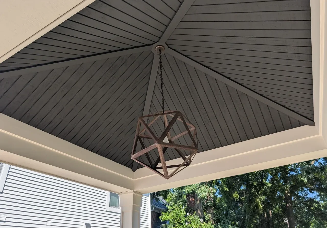Outdoor ceiling with geometric light fixture
